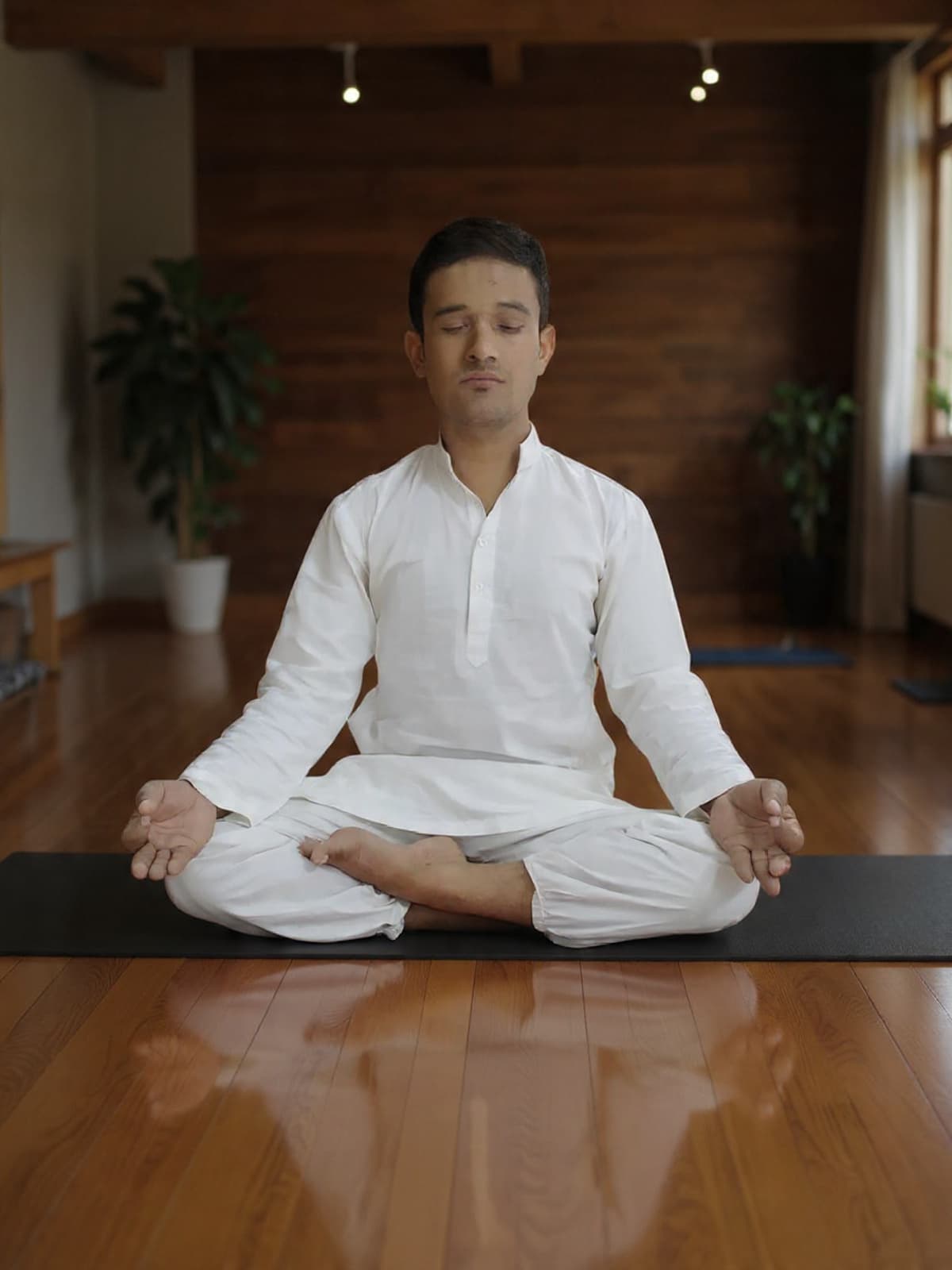 Yash teaching traditional yoga